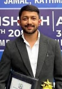 Dr. Nigam Paudel